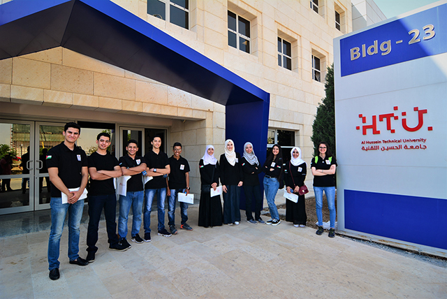 Young men and women from Haqiq Initiative pose for a group photo as they tour Al Hussein technical University in Amman (Photo courtesy of Crown Prince Foundation)